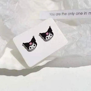 اقراط الاذن ( تراجي ) على شكل كورومي